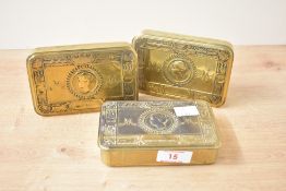 A set of three World War 1 Princess Mary Gift brass tins, decorated including various allies and