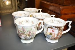 Five collectable Royal Doulton Brambley Wedge Winter Beaker bone China cups, decorated with
