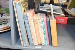 A selection of novels, to include Winnie-The-Pooh by E.H. Shepard, Through The Looking Glass by