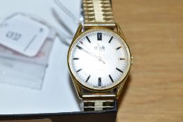 A stainless steel gold tone Corvette 17 Jewel Incabloc wristwatch, the champagne dial having baton