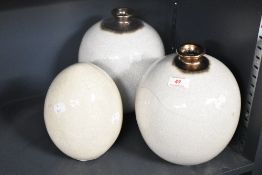 Two contemporary crackle glazed Globular vases with bronze tinted necks, h22cm, sold together with a