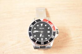 A Sekonda wristwatch, the circular black dial having geometric numerals and date aperture, on a