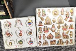 Two boxes of mid / late 20th century Christmas wooden tree decorations, to include elfs, stars,