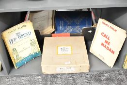 A large box of musical scores include The Boy Friend - A new musical comedy of the 1940's, sold