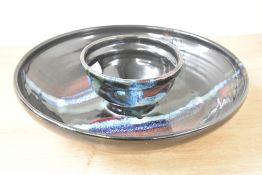 A large chip-in-dip studio ceramic bowl, decorated in a multicoloured glaze, signed to base, 29cm