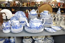 A large collection of Spode Italian pattern dinner and tea wares, to include three tea pots, cups,