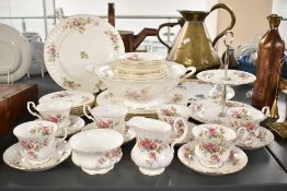 A Royal Albert bone china Moss Rose pattern tea service, to include a punch bowl 30cm, cake stand