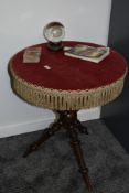A 19th century bobbin leg gypsy table, decorated with red velvet top with fringe, h63cm x w53cm,