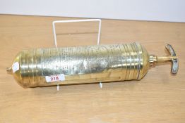 A late 19th / early 20th century brass Pyrene fire extinguisher, instructions engraved to front,