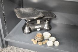 A set of vintage 'Weylux' scales in black with chrome pan and weights, w30cm.