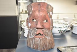 A vintage hand carved pine bust in the style of a Viking warrior, h30cm.