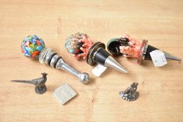 A Millefiori style glass wine bottle stopper, h9.5cm, sold together with two other wine bottle