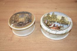 Two ceramic Pratt ware pots and lids, the lids depicting a scene of Strasburgh and the Chapel Royal,