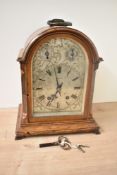 A late 19th / early 20th century oak chiming bracket clock by highly regarded German makers