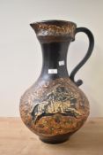 An unusual mid-century West German fat lava pottery jug, decorated with Assyrian equestrian