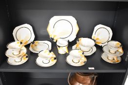 A decorative Shelley Porcelain Vogue Sun Set Art Deco pattern tea set, factory mark to base, approx.