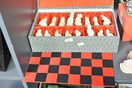 A late 20th century Chinese 32 piece chess set, the figures depicting ancient warriors, including