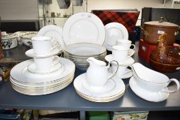 A Royal Doulton signature Gold pattern tea service in ice white with gilt edging, to include soup