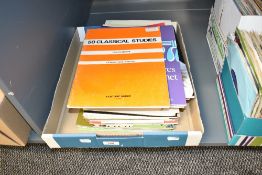 A box of music scores, several types include The Beatles Clarinet, Pianoforte 1982, The Easiest June