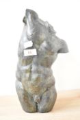 A mid /late 20th century faux bronze table top study of a male torso, modelled in the classical