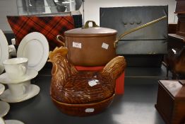 A solid copper and brass lidded cooking pot, impressed mark 'Castle Brand' to base, h13cm, sold