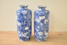 An attractive pair of early 20th century Leighton pottery oriental style vase's, decorated in blue