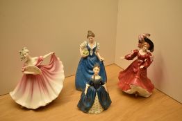 A group of four Royal Doulton bone china figurine comprising 'Debbie' HN 2385, Figure of the Year