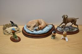 A Border Fine Arts study, modelled resting Great Dane signed E. Waugh sold alongside 'Moses with