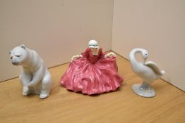 An early Royal Doulton figurine 'Polly Peachum' HN 549 sold together with two Lladro porcelain
