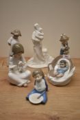 Five Nao by Lladro porcelain figures comprising 'Hush Now' number 1069, 'Here I am' number 1286, 'So