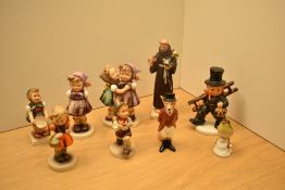 A group of seven Goebel figures comprising 'St Francis', 'Which Hand' number 258, 'Telling Her