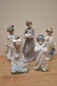 Five Lladro and Nao by Lladro porcelain figurines comprising 'How Pretty' number 1110, 'Angel with