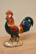 A Beswick Pottery Leghorn Cockerel model number 1892 in teal green, red, orange and yellow gloss