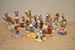 Twenty Two Royal Doulton bone china Bunnykins Series figures including characters 'Seaside