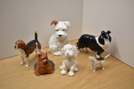 A small collection of Beswick Pottery dog studies, comprising Sheepdog (large) number 1792 in
