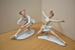 Two mid century German Wallendorf porcelain ice skater figurines, each modelled mid routine, with