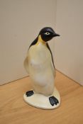 A Poole Pottery penguin study,measures 22cm tall.