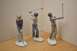 A group of three Casades golfing figures, all in different stances. Measuring 25cm tall.