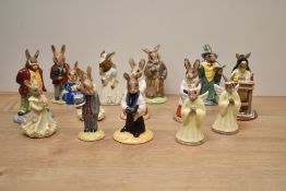 A group of fourteen Royal Doulton bone china Bunnykins Series figures including characters 'Groom
