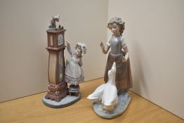 A Lladro porcelain figure 'Bed Time' number 5347 sold alongside A Nao by Lladro 'Girl With Geese'.