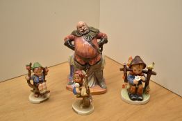 A Royal Doulton bone china figure 'Falstaff' HN 2054 sold alongside three Goebel figurines 'Apple