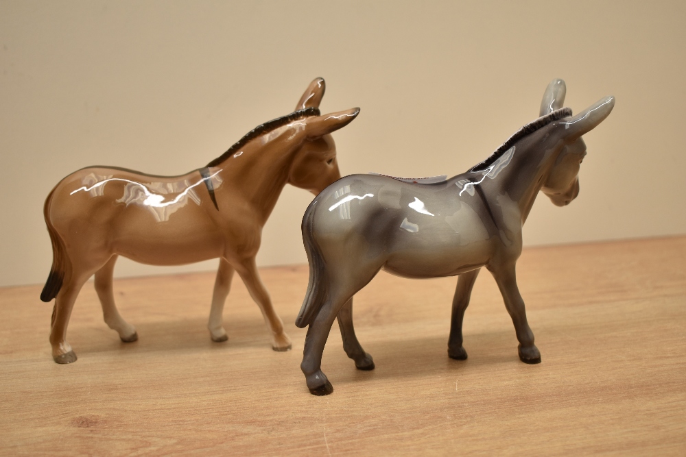 A pair of John Beswick pottery donkey's, in brown and grey gloss finish, both signed to the - Image 2 of 3
