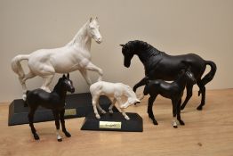 A Beswick Pottery animal study a Mare facing left number 976 sold alongside Foal lying number 915 (