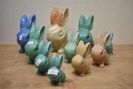 A group of ten vintage Sylvac bunnies including colours blue, green and tan. Ranging in size, the