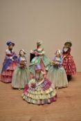A group of six early Royal Doulton bone china figures comprising 'Kate Hardcastle' HN 1719, 'Dorcas'