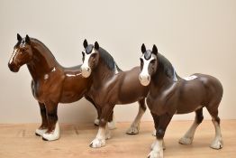 Two Beswick Pottery Clydesdale horse studies number 2645, missing harnesses and one having damage,