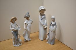 Two Nao by Lladro figurines 'Feeding The Goat' number 4590 and 'How Pretty' number 1110 sold