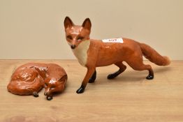 Two Beswick Pottery fox studies Fox-Standing 1016a designed by Arthur Gredington in red brown and