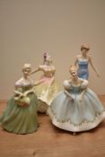 A group of four Royal Doulton bone china figurines comprising 'Diana Princess of Wales' HN 5061 (