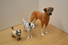 A Royal Doulton bone china Dalmatian HN1114 sold together with a Beswick Pottery study of a Cairn
